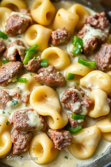 Cheesesteak Tortellini in Rich Provolone Sauce presentation